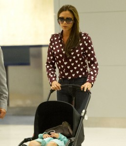 Victoria Beckham and daughter Harper arrive at JFK airport in NYC